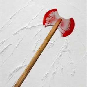 Red and White Toy Axe